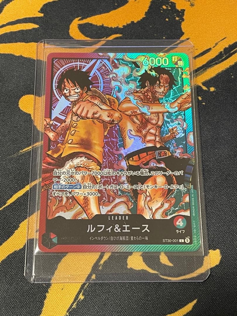 One Piece card showing Monkey D. Luffy & Portgas D. Ace Leader ST30-001 from Japan import