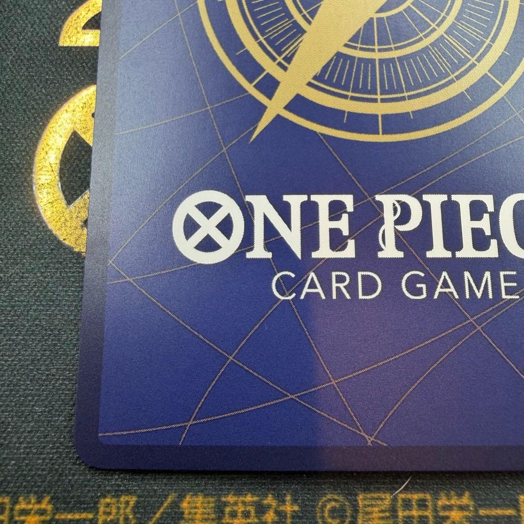 One Piece OP13-007 SR parallel figure card showing Ace, Sabo, and Luffy in PSA sleeve