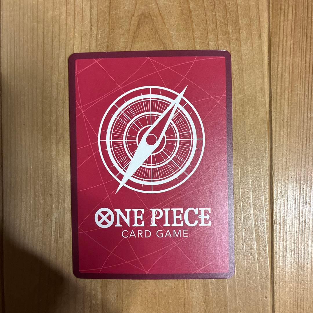 One Piece Monkey D Luffy ST01-001 anime illustration card with hologram effects in protective sleeves