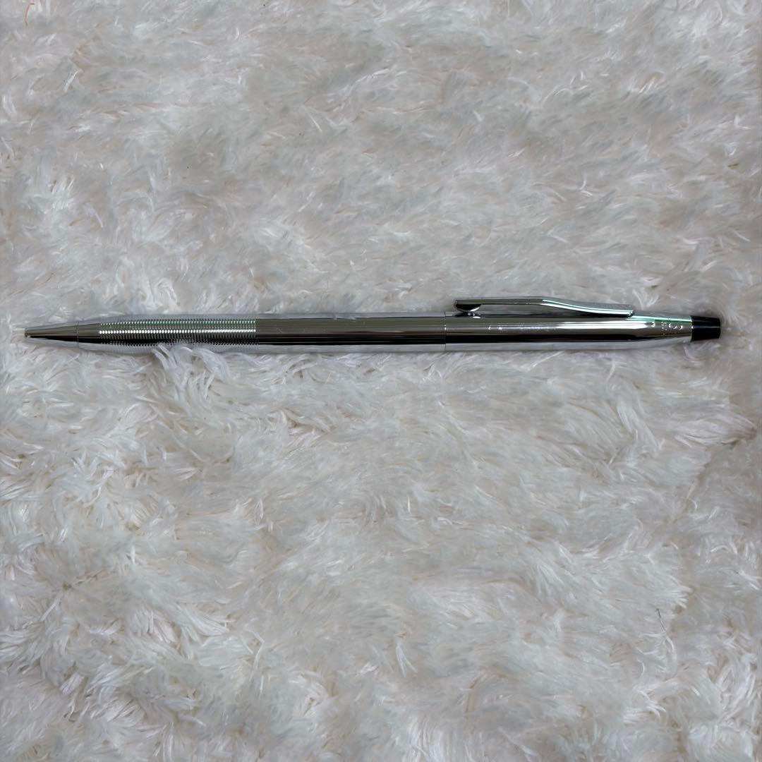 CROSS gold ballpoint pen with gold body and included box showing signs of storage wear