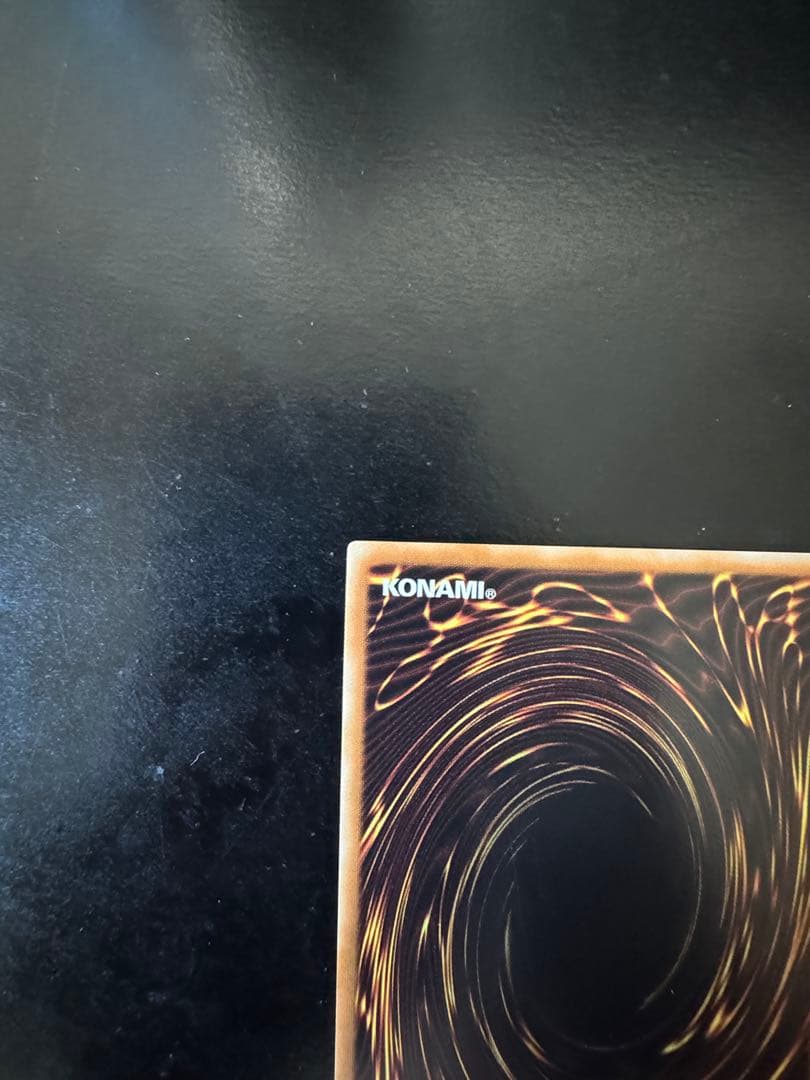 Yu-Gi-Oh! Asia Edition Dark Magic Curtain Ultra Rare card with holographic effects, sleeved