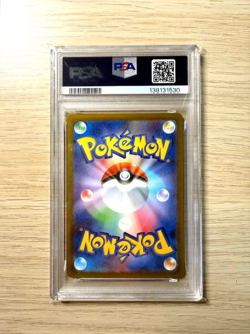 Eevee Pokémon trading card graded PSA 10 with minor scratches in protective case from Japan import