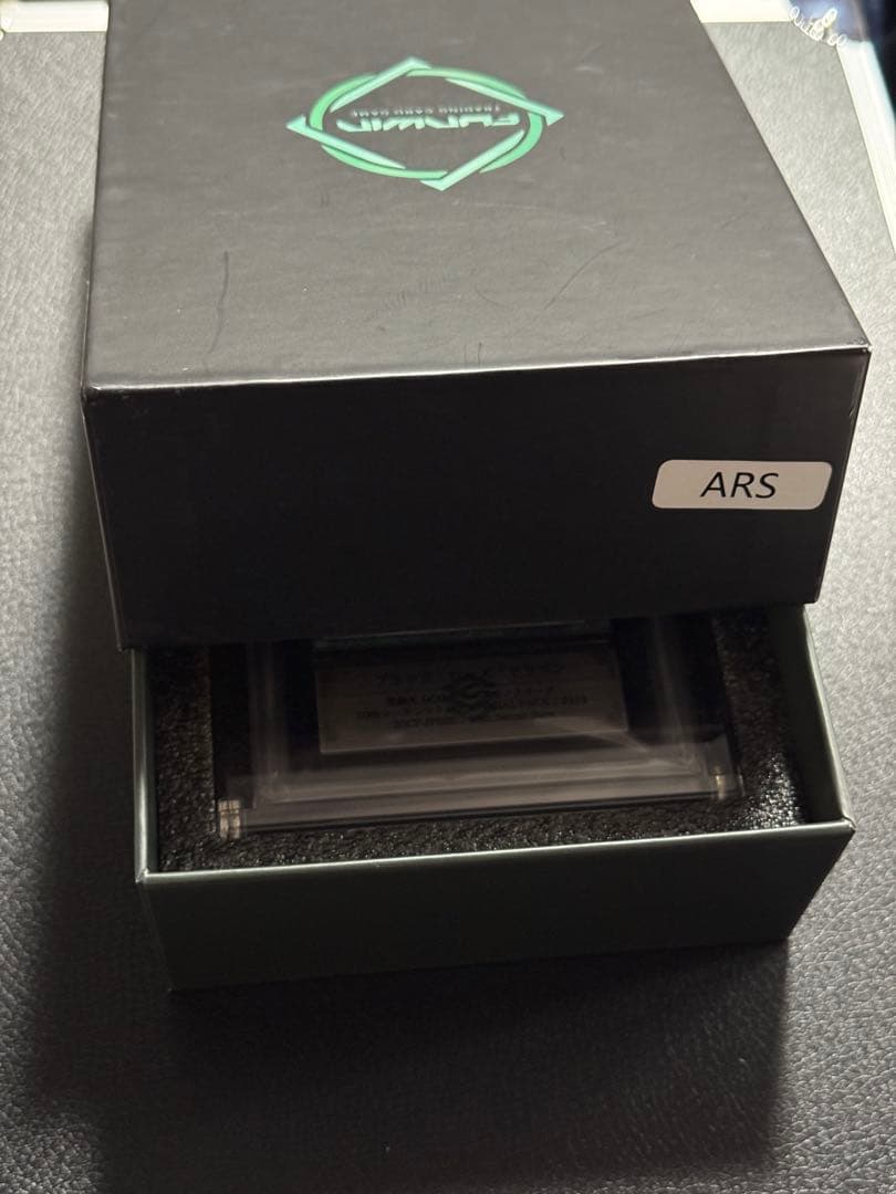 Yugioh Black Rose Dragon 20th ARS10+ card with acrylic case showing front and box with scratches