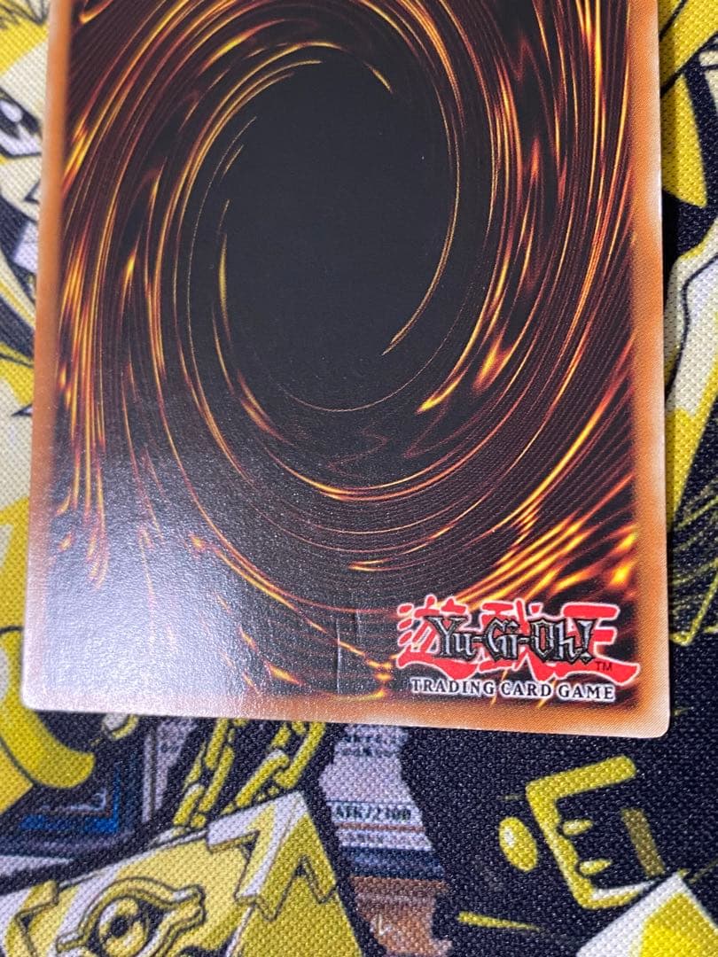 Yu-Gi-Oh Harpies Pet Baby Dragon Relief 1st Edition card showing front with slight dent and scratch on back
