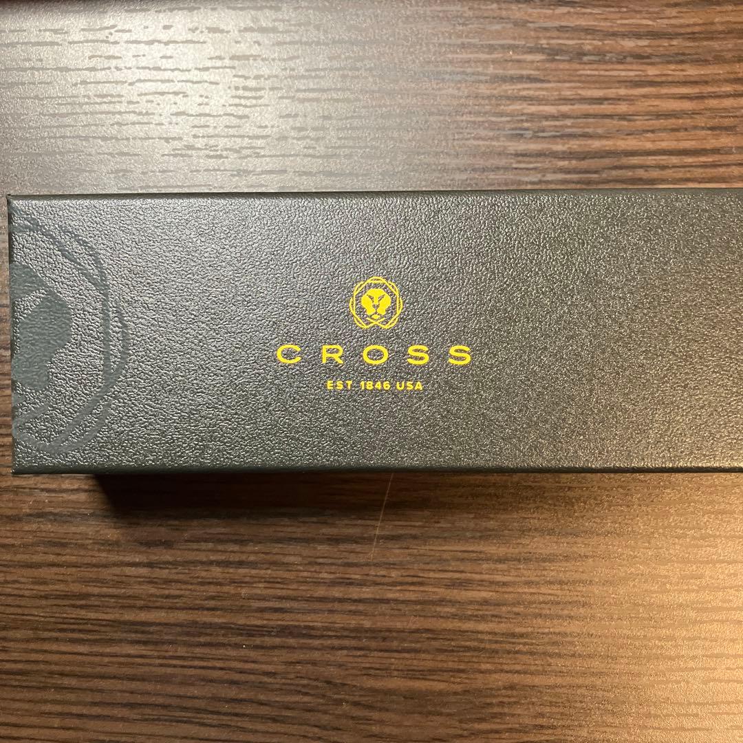 Brand Cross ballpoint pen in black with silver accents shown with a presentation box