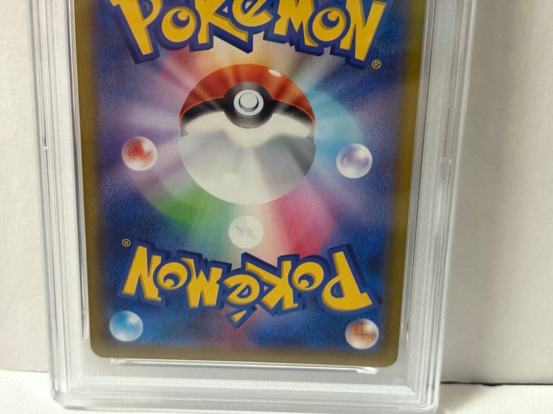 Pokemon Card featuring Pikachu from Dark Nemesis set graded PSA10 with visible flaws and included case
