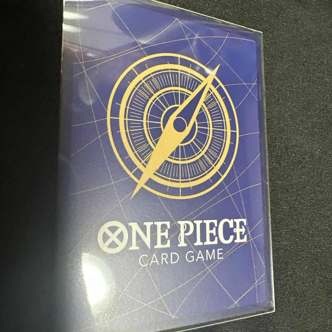 Sabo SP PRB02-014 One Piece Card Game card placed in protective sleeve