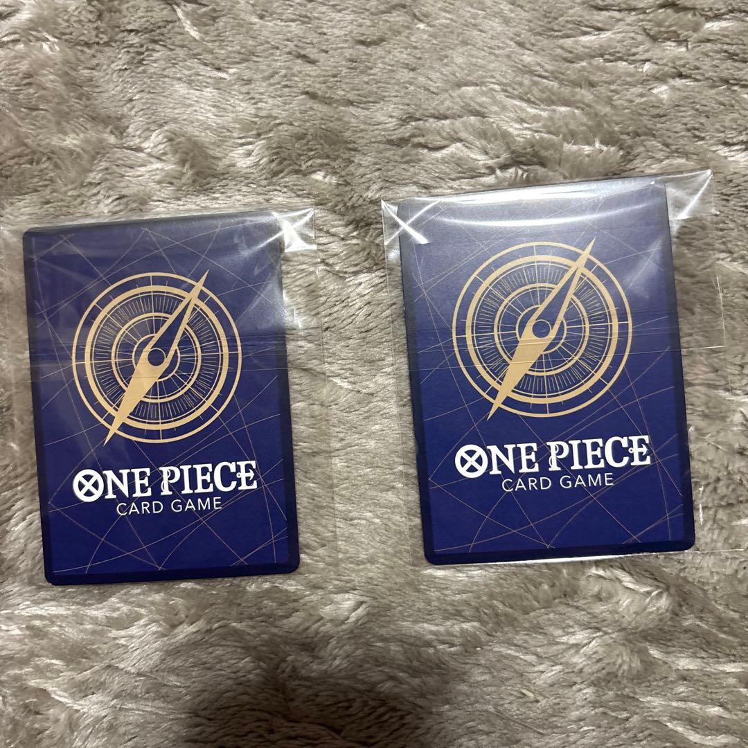 One Piece Monkey D. Luffy OP16-034R trading card with bonus OP16-015SR displayed with sleeve
