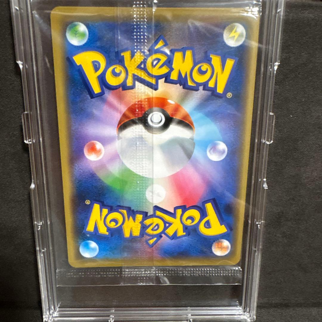 Sealed Bandai Pokemon Card booster pack with Reshiram 366/SM-P promo card in card loader Japan import