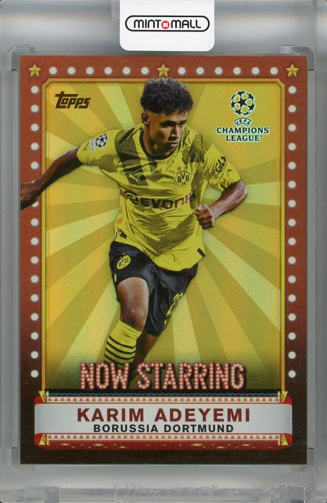 2022-23 Topps UEFA Club Competitions Borussia Dortmund Karim Adeyemi Now Starring Orange #NS-2 parallel card numbered 14 of 25