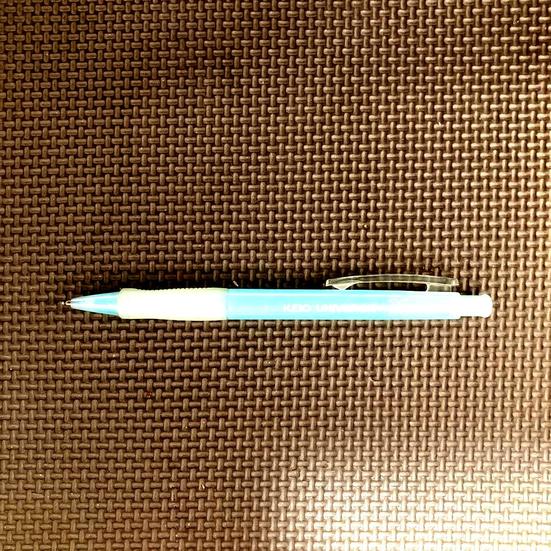 Light blue grip marker pen with Keio University and Cross Pen logos