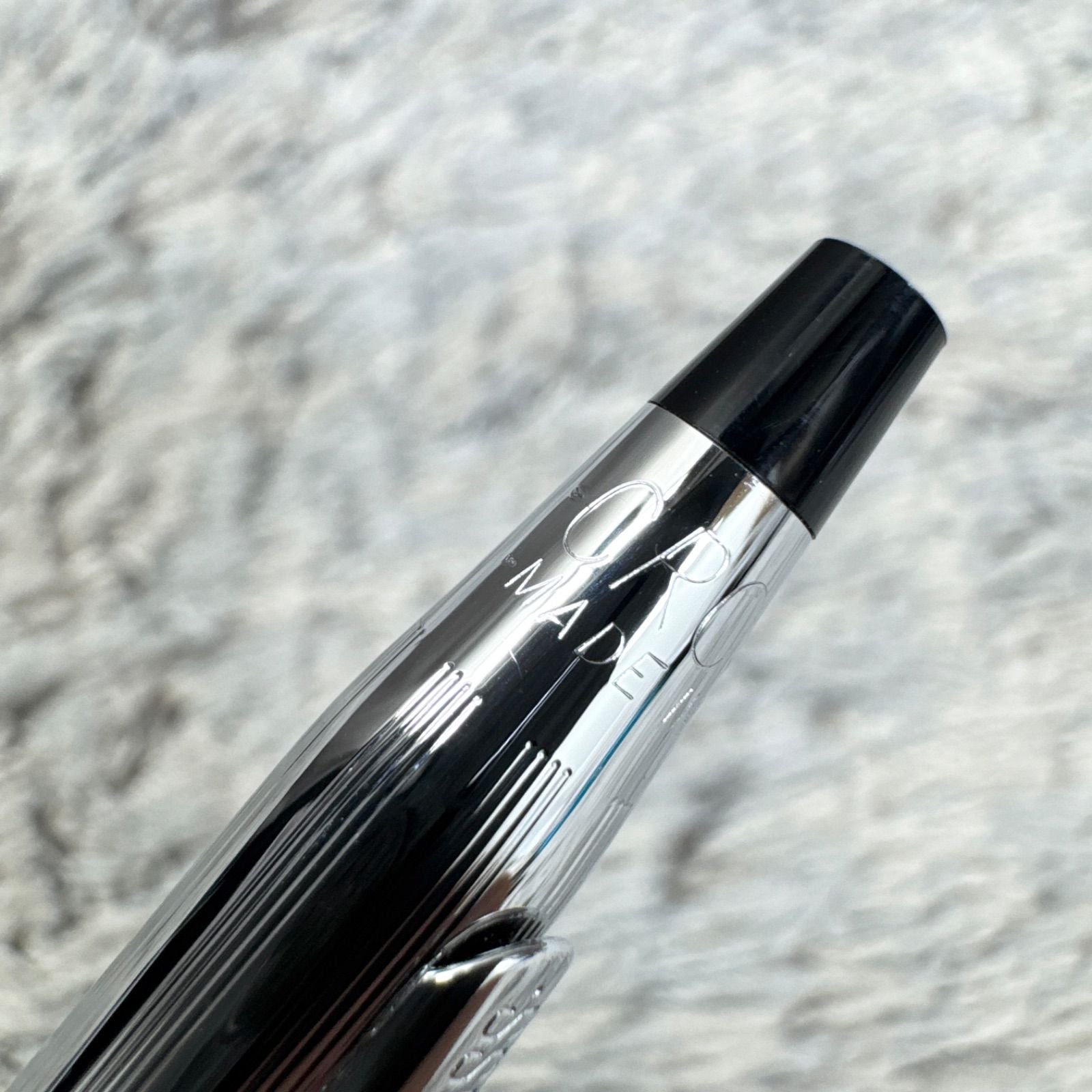 Cross Twist ballpoint pen with blue ink, Japan import, showing small scratches and twist-style design