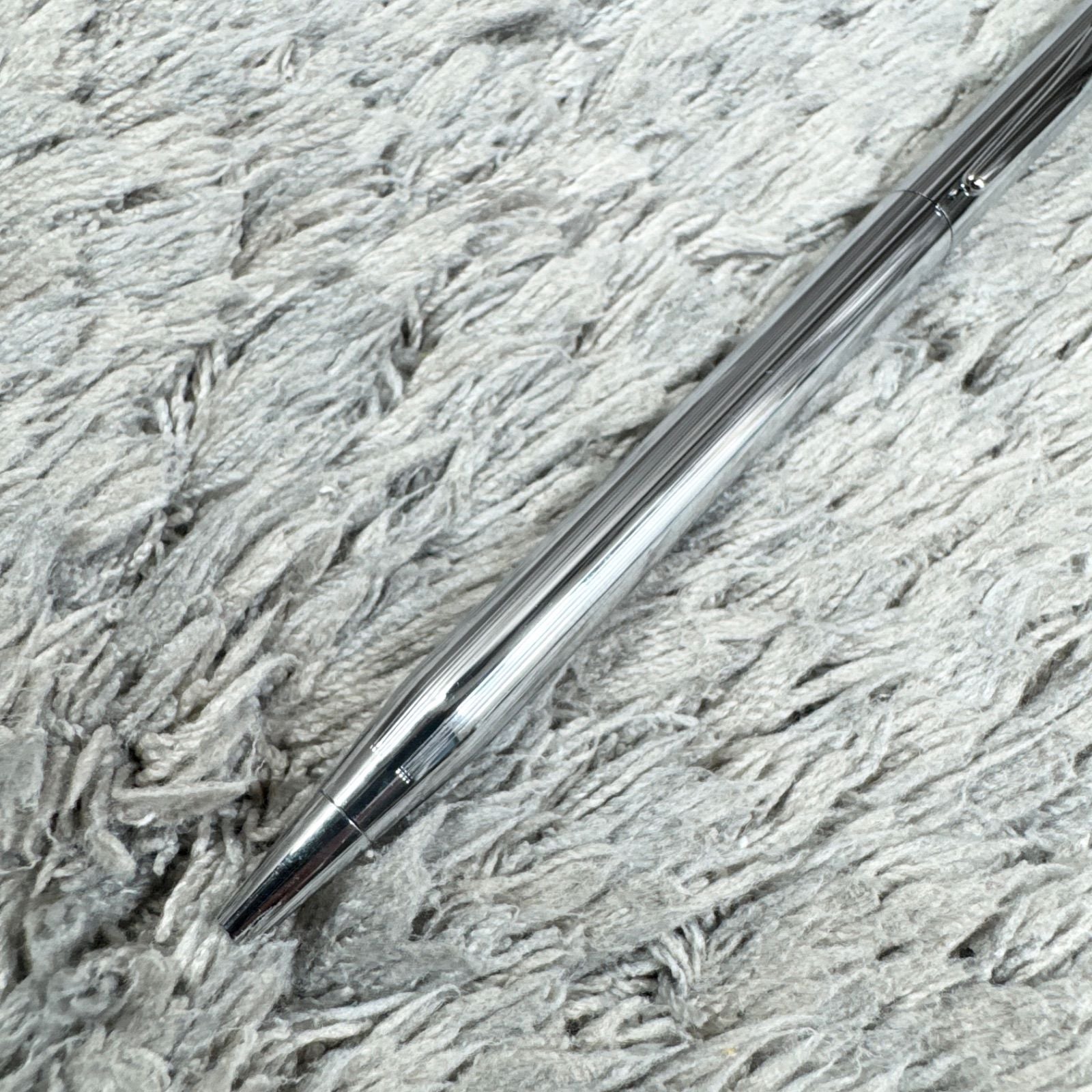 Cross Twist ballpoint pen with blue ink, Japan import, showing small scratches and twist-style design
