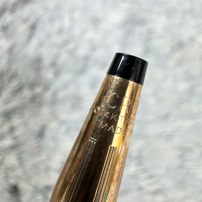 Cross 14KT gold twist mechanical pencil with slight scratches and light stains shown with its case