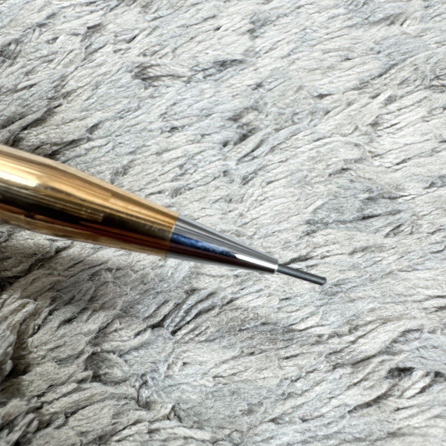 Cross 14KT gold twist mechanical pencil with slight scratches and light stains shown with its case