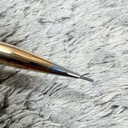 Cross 14KT gold twist mechanical pencil with slight scratches and light stains shown with its case