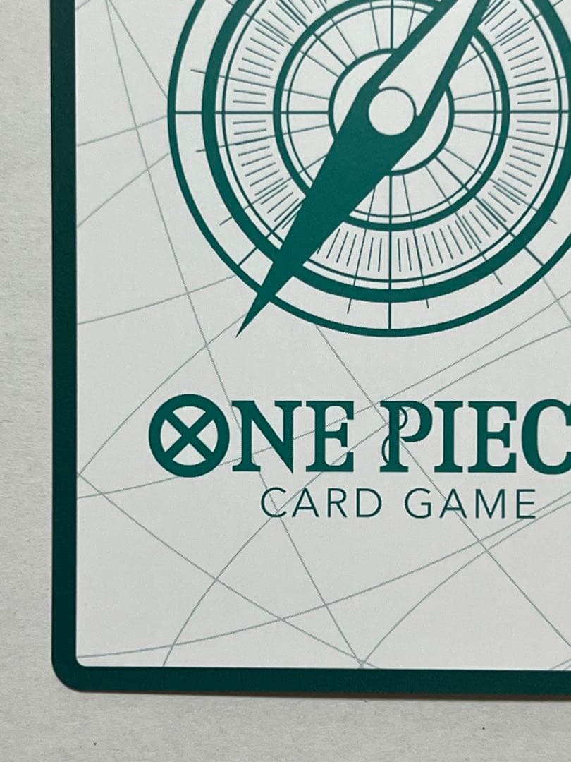 One Piece Card Game Robin Gold Don Super Parallel collectible card with protective sleeve