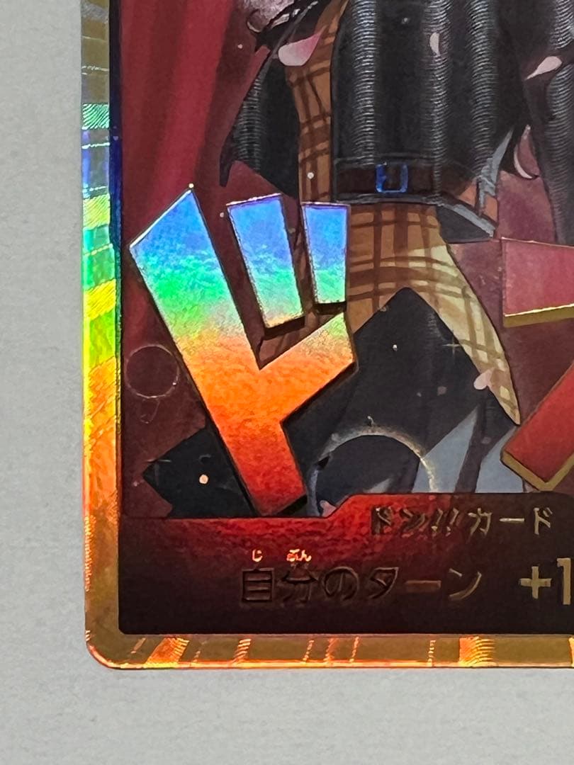 One Piece Card Game Robin Gold Don Super Parallel collectible card with protective sleeve