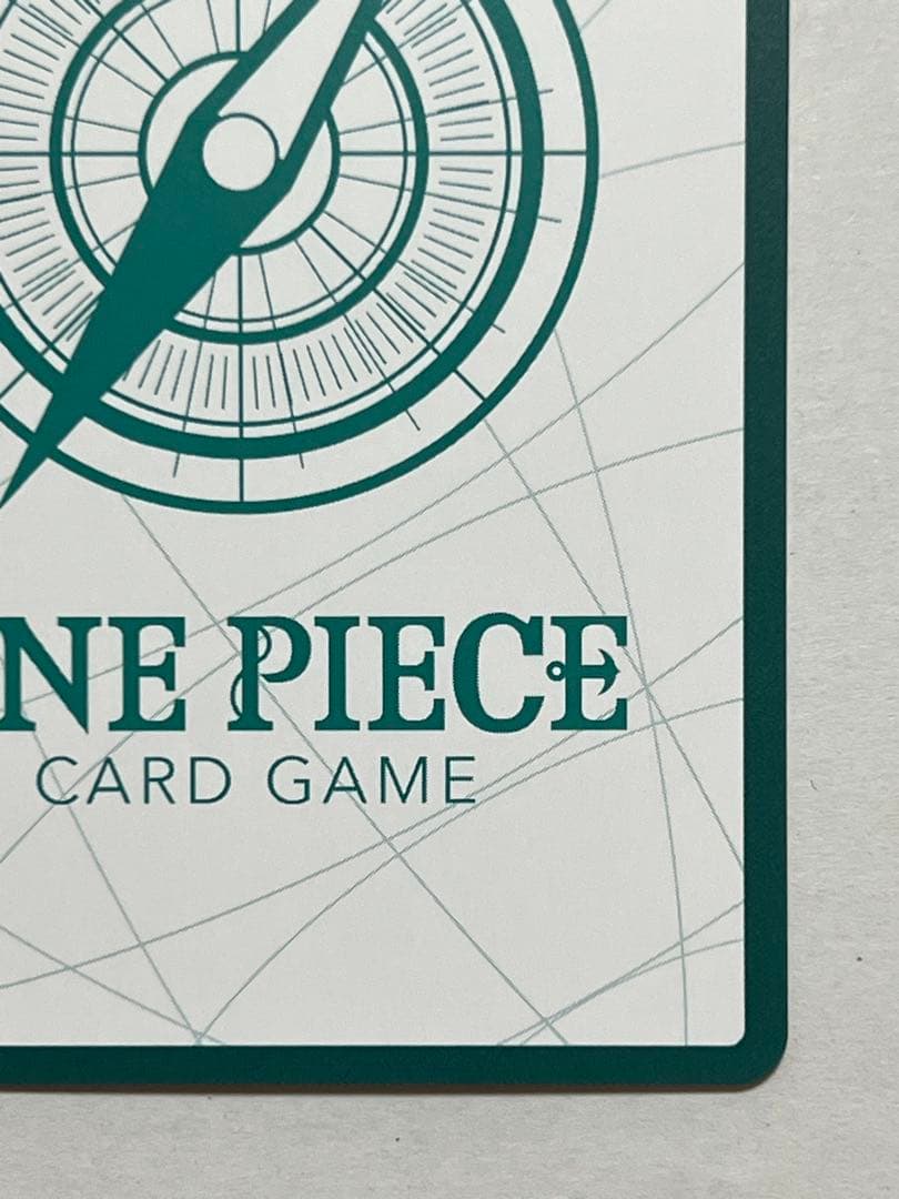 One Piece Card Game Robin Gold Don Super Parallel collectible card with protective sleeve
