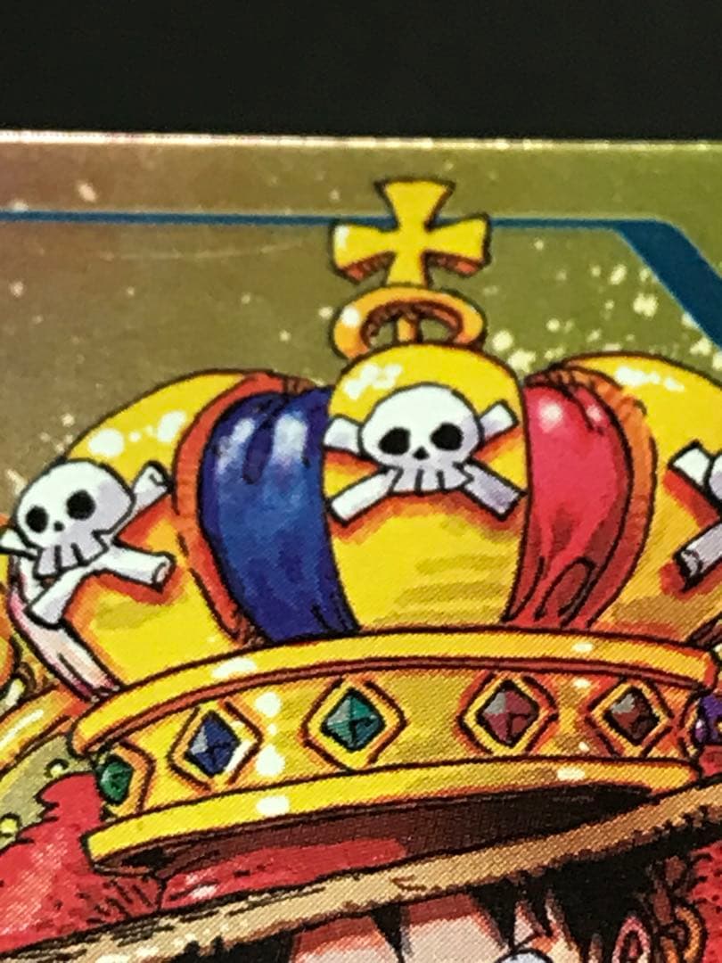 One Piece Monkey D. Luffy Promo Card P-043 from Weekly Jump with visible scratches and white chipping