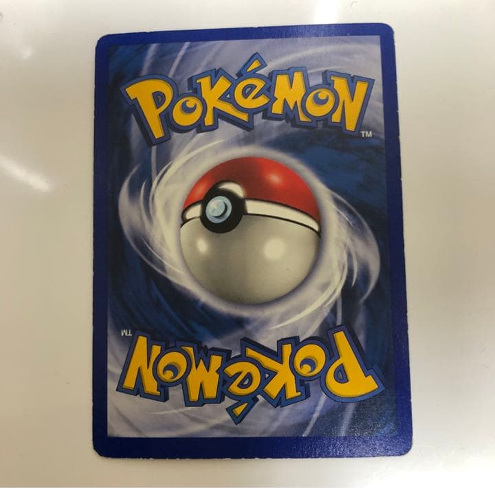 1999 Shadowless First Edition Blastoise Pokemon card English version showing front with minor back scratches