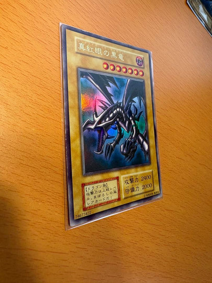 Yu-Gi-Oh Red-Eyes Black Dragon Ultra Rare card initial version with minor scratches shown