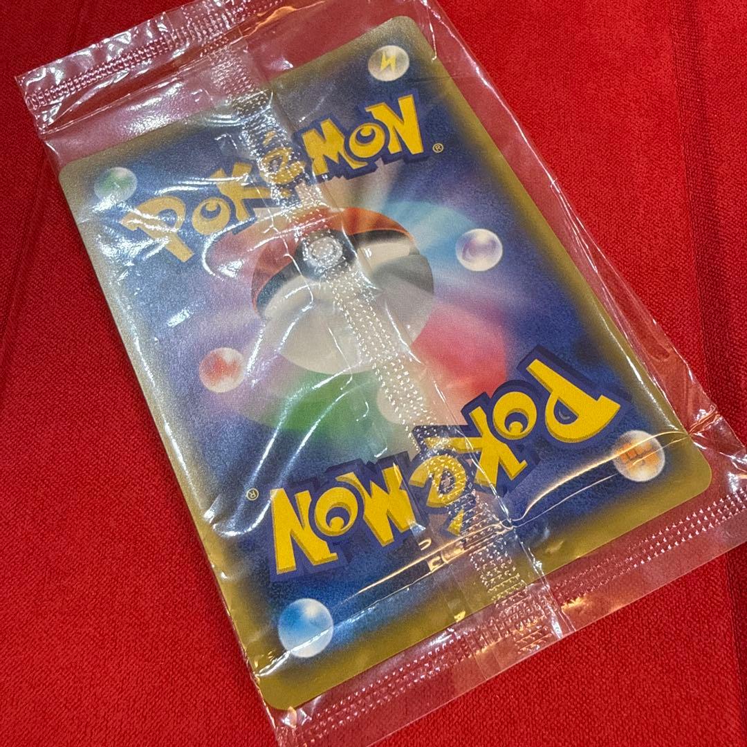 Sealed Sega Pikachu Promo Rare Movie Evolution Pokémon Card 369/SM-P from 2019 with minor plastic bends