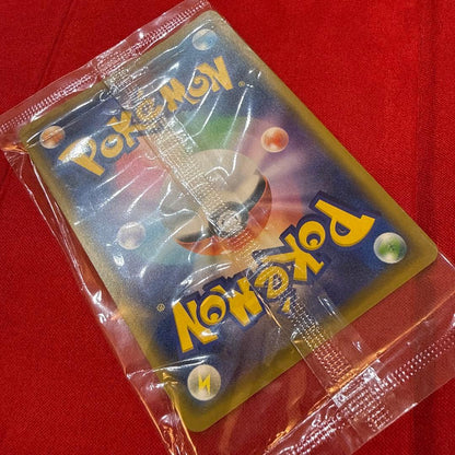 Sealed Sega Pikachu Promo Rare Movie Evolution Pokémon Card 369/SM-P from 2019 with minor plastic bends
