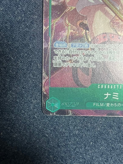 Bandai Nami Premium Card OP02-036 parallel film showing front with Bandai branding and parallel type details