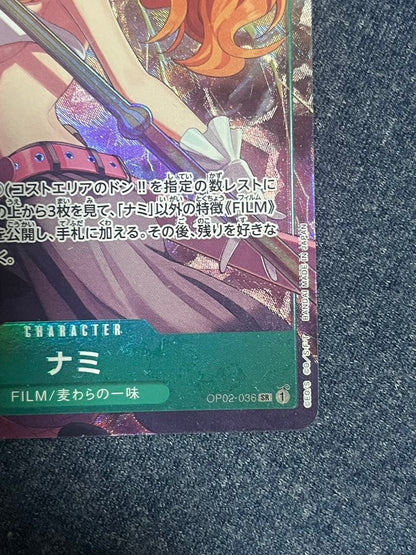 Bandai Nami Premium Card OP02-036 parallel film showing front with Bandai branding and parallel type details