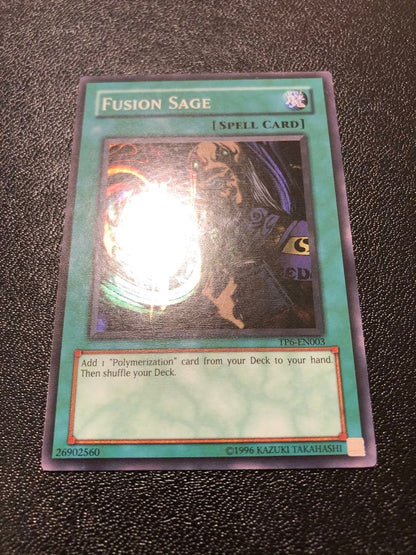 Yu-Gi-Oh Fusion Sage TP edition super rare trading card with visible scratches front view