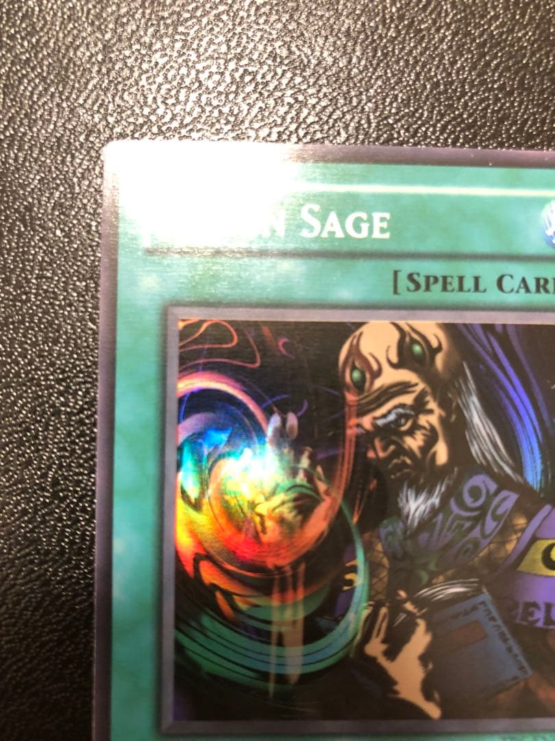 Yu-Gi-Oh Fusion Sage TP edition super rare trading card with visible scratches front view