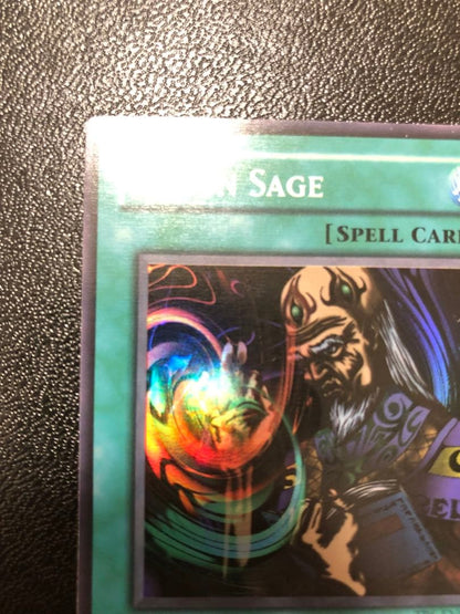 Yu-Gi-Oh Fusion Sage TP edition super rare trading card with visible scratches front view