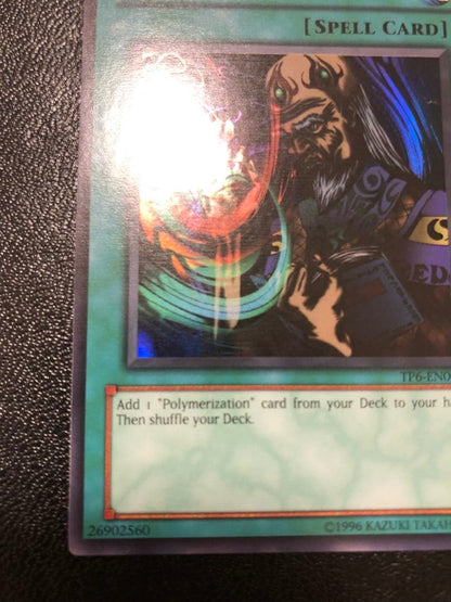 Yu-Gi-Oh Fusion Sage TP edition super rare trading card with visible scratches front view