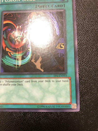 Yu-Gi-Oh Fusion Sage TP edition super rare trading card with visible scratches front view