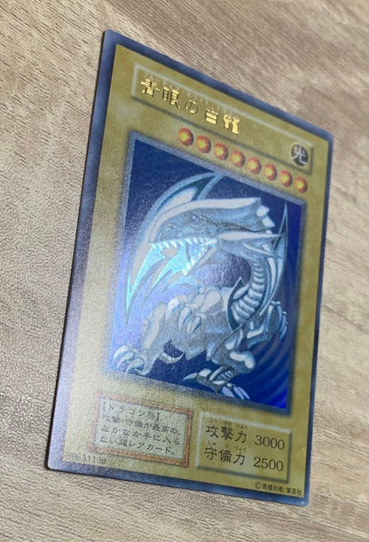 Vintage Yu-Gi-Oh Blue Eyes White Dragon Initial Ultra trading card with retro appearance