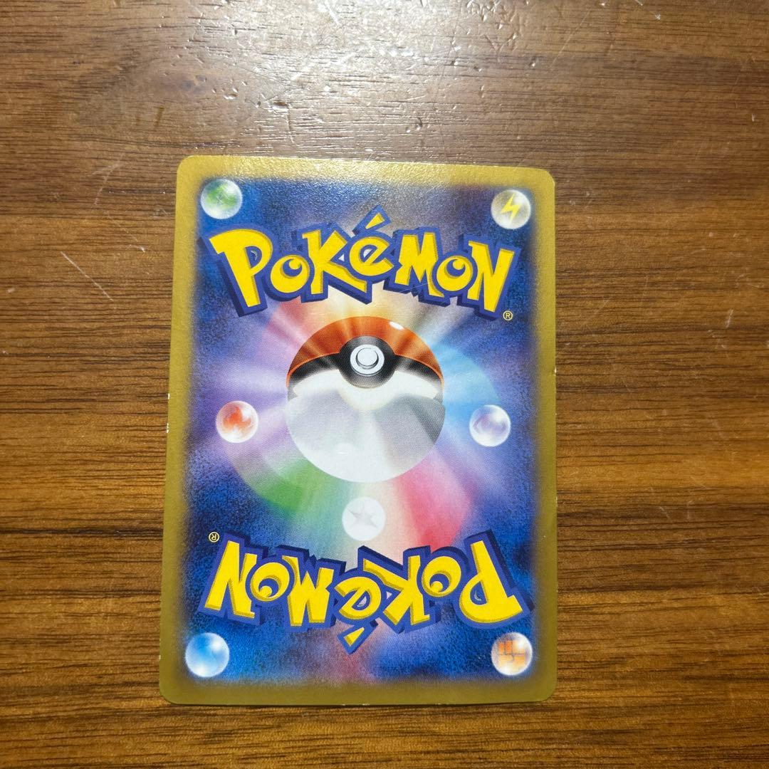 Japan National Team Pikachu Pokémon collectible card model 050 from XY-P series with visible scratches and dirt