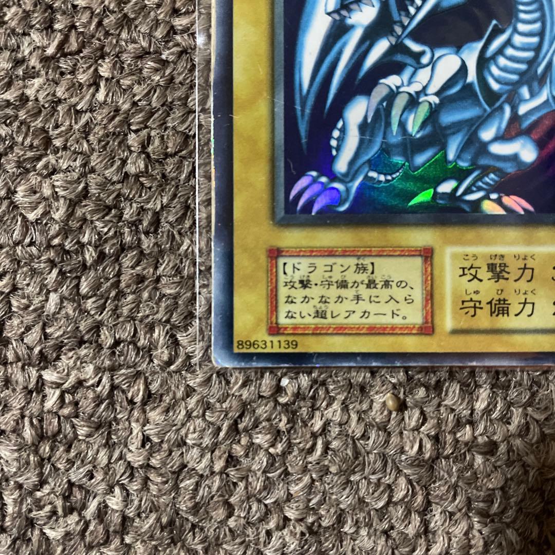 Yugioh Blue-Eyes White Dragon Initial Edition trading card from Japan in protective sleeve