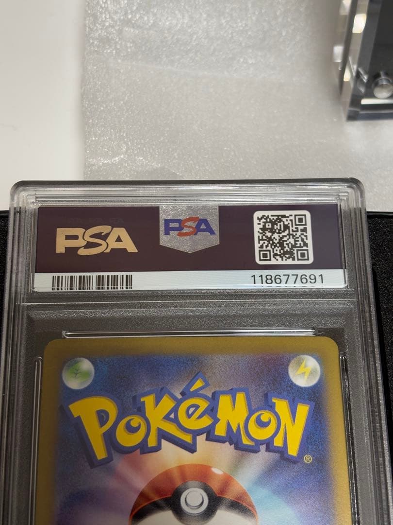 Sony Scarlet & Violet PSA10 Pikachu Promo SV-P trading card with Volt Tackle Spark, graded and in protective sleeve