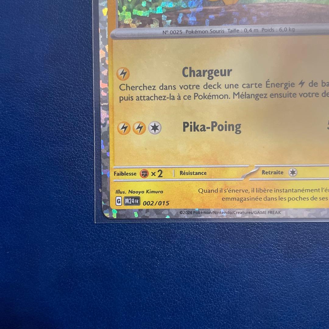 McDonald's 2024 French Pikachu Holo Pokémon promo card in protective sleeve with minor wear