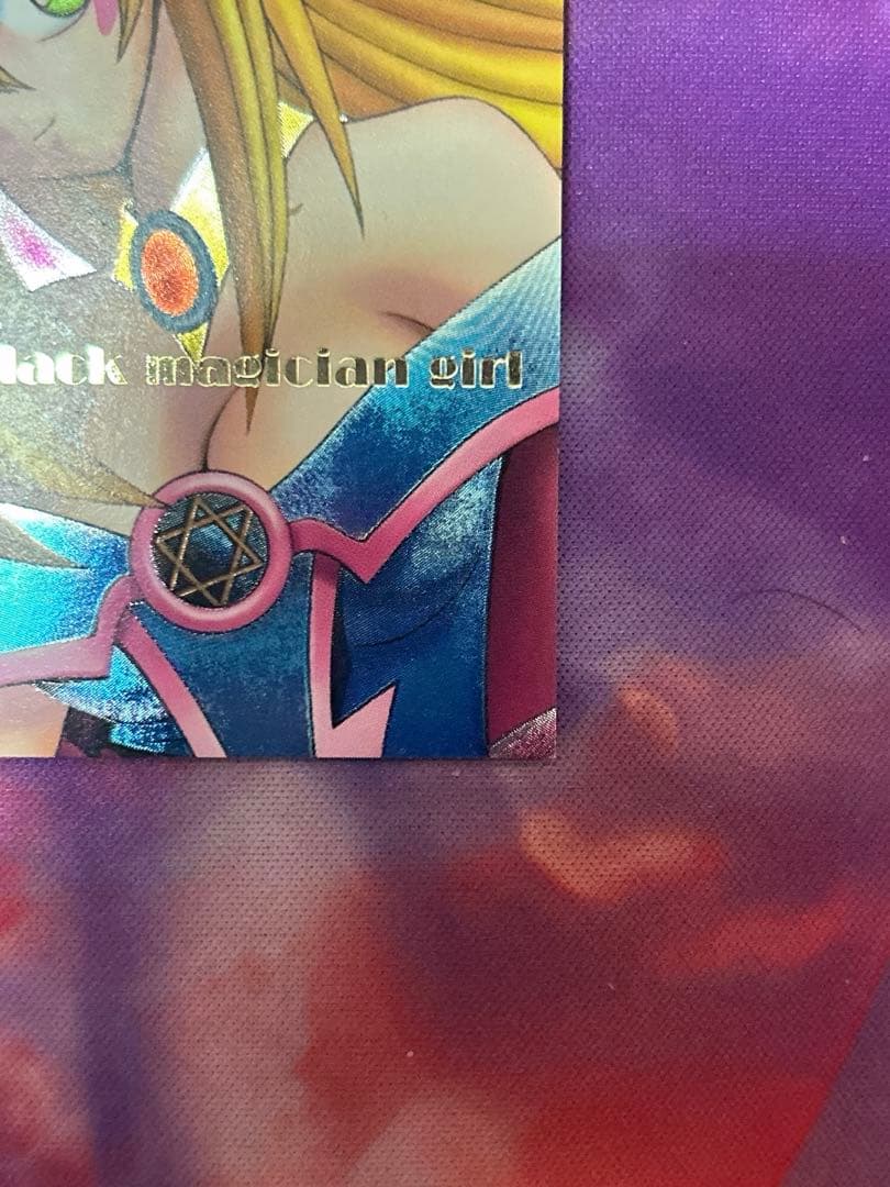 Yugioh Black Magician Girl Dungeon Dice Monsters ultimate rare secret rare monster card with gold text on pink background