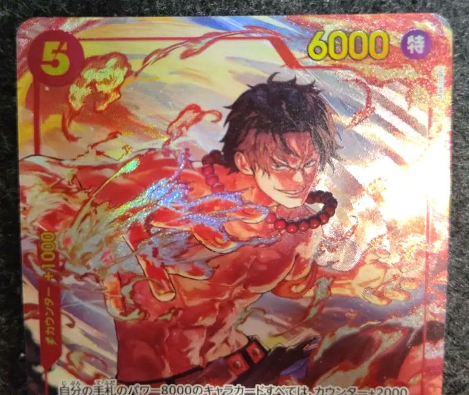 Sealed One Piece Portgas D. Ace OP16-118 SEC trading card from Japan in protective sleeve