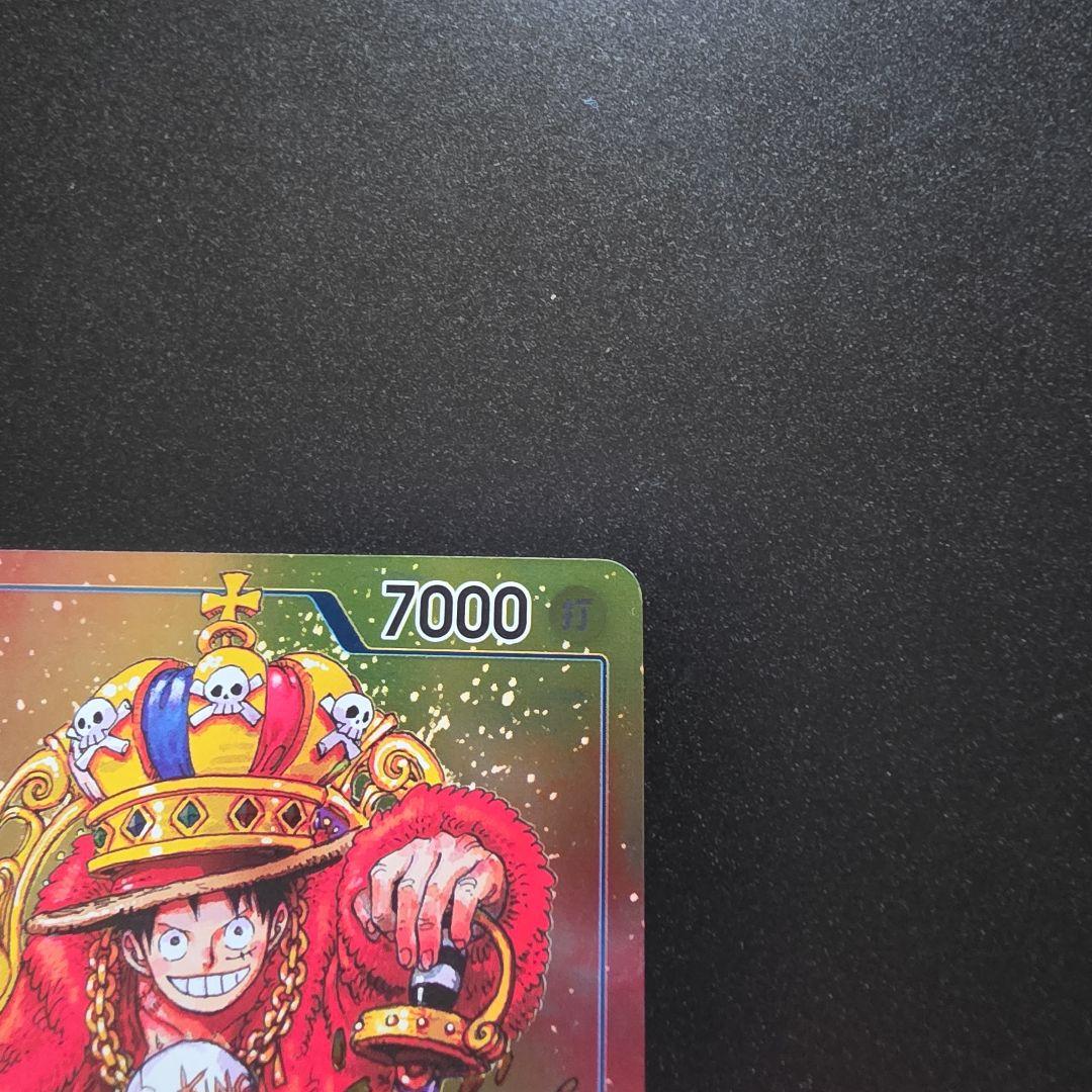 Bandai One Piece Monkey D. Luffy P-043 character card featuring Luffy with crown, Japan import