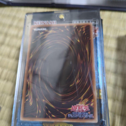Bandai Red Eyes Black Dragon 25th Collector's single trading card in protective sleeve