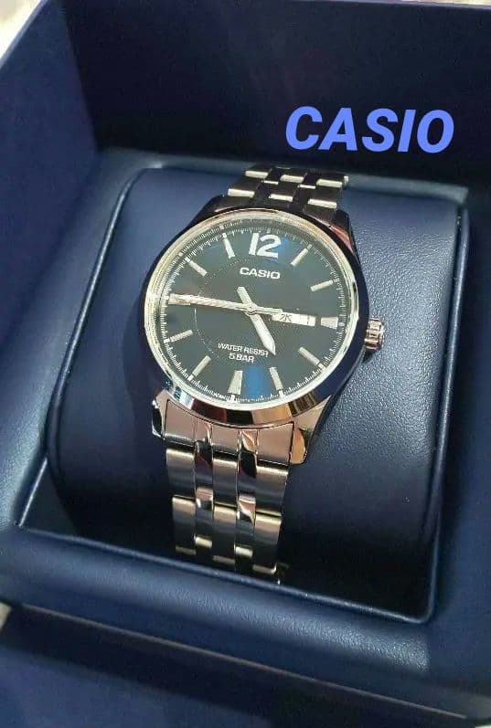 Casio Analog Quartz Watch with Navy and Silver Stainless Steel Band