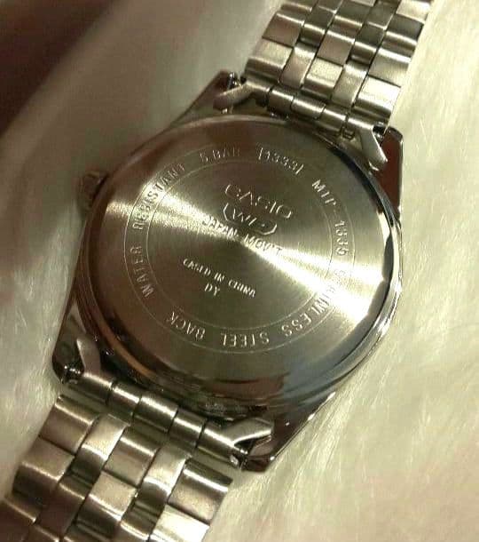 Casio Analog Quartz Watch with Navy and Silver Stainless Steel Band