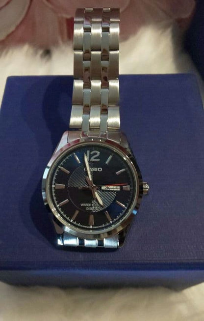 Casio Analog Quartz Watch with Navy and Silver Stainless Steel Band