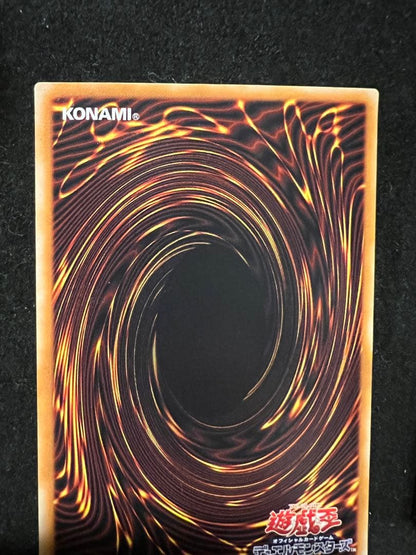 Yu-Gi-Oh Chaos Soldier Kaiba's Emitter Ultra Parallel card showing wear and creases, packaged for shipping