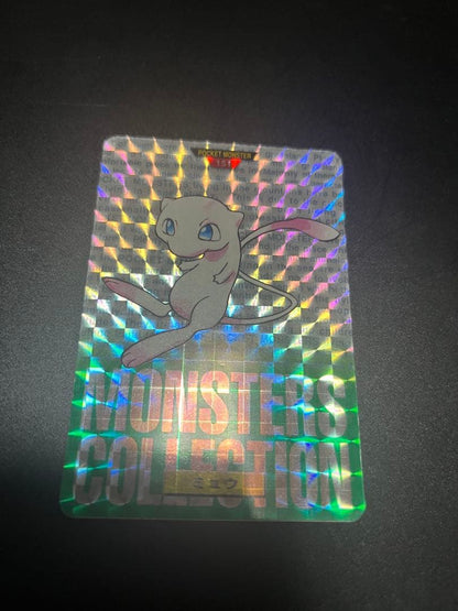 1996 Bandai Pokemon Monster Collection Mew trading card with green background