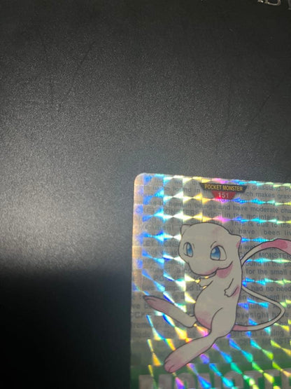 1996 Bandai Pokemon Monster Collection Mew trading card with green background